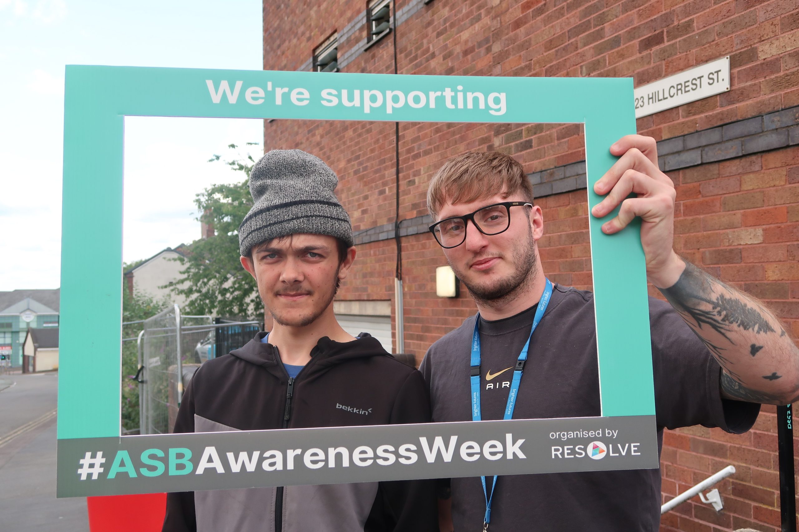 Customer and staff engaging in ASB week for litter picking
